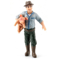 Farmer Holding Pig Figurine