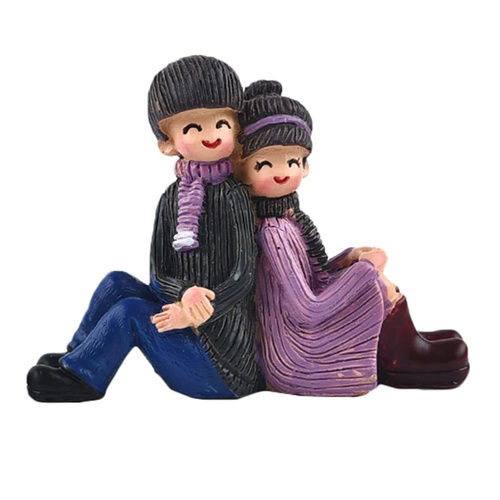 Couple Sitting Back To Back Figurine
